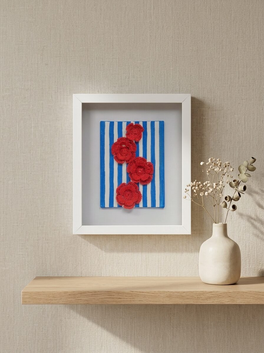 Handmade floral artwork showcasing ruby colored blossoms and botanical beauty